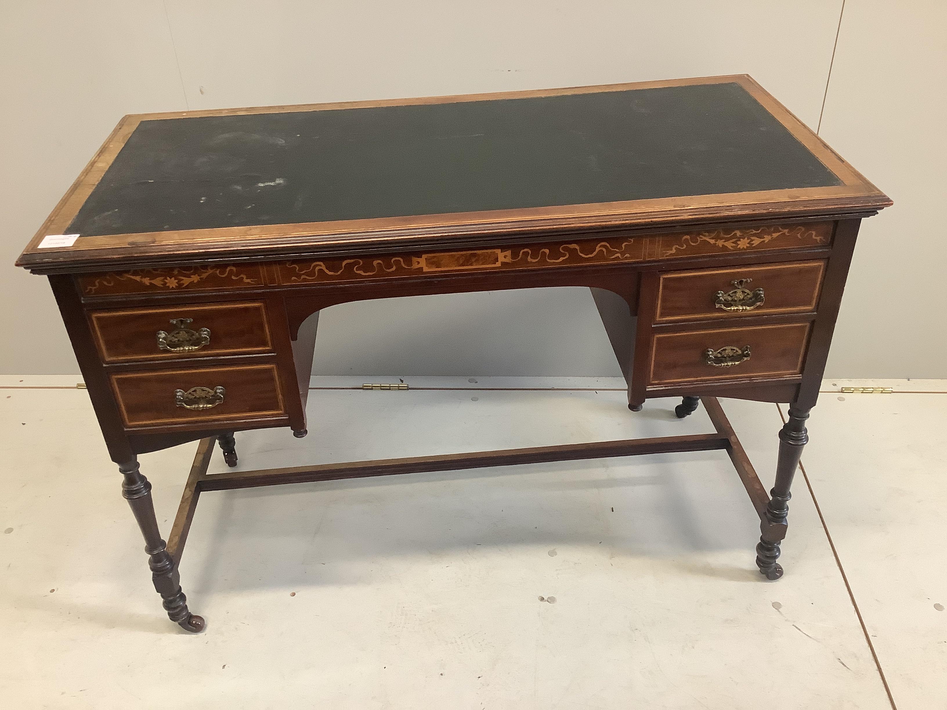 An Edwardian marquetry inlaid mahogany kneehole writing desk, width 107cm, depth 50cm, height 73cm together with an Edwardian marquetry inlaid elbow chair